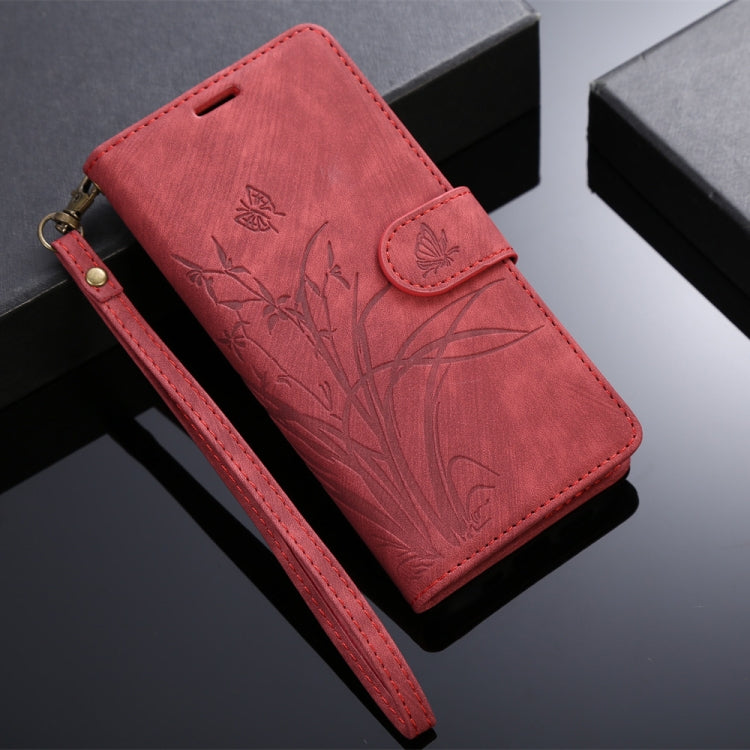 Red Orchid Butterfly Embossed Leather Phone Case for iPhone XS Max, showcasing its elegant design and functional features.